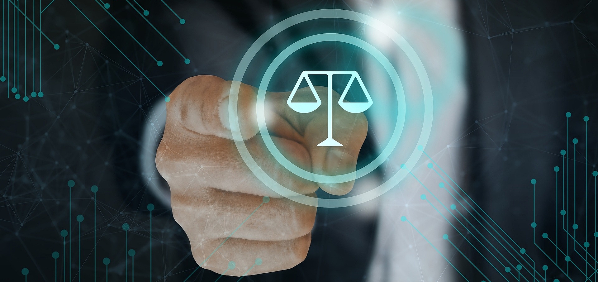 Eine männliche Hand tippt mit dem rechten Zeigefinger auf ein Symbol, dass eine Waage darstellt. Die Waage steht für das Rechtssystem