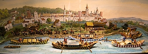 Gemälde das im Vordergrund den Inn mit Schiffsverkehr zeigt und im Hintergrund die Stadt Mühldorf a. Inn