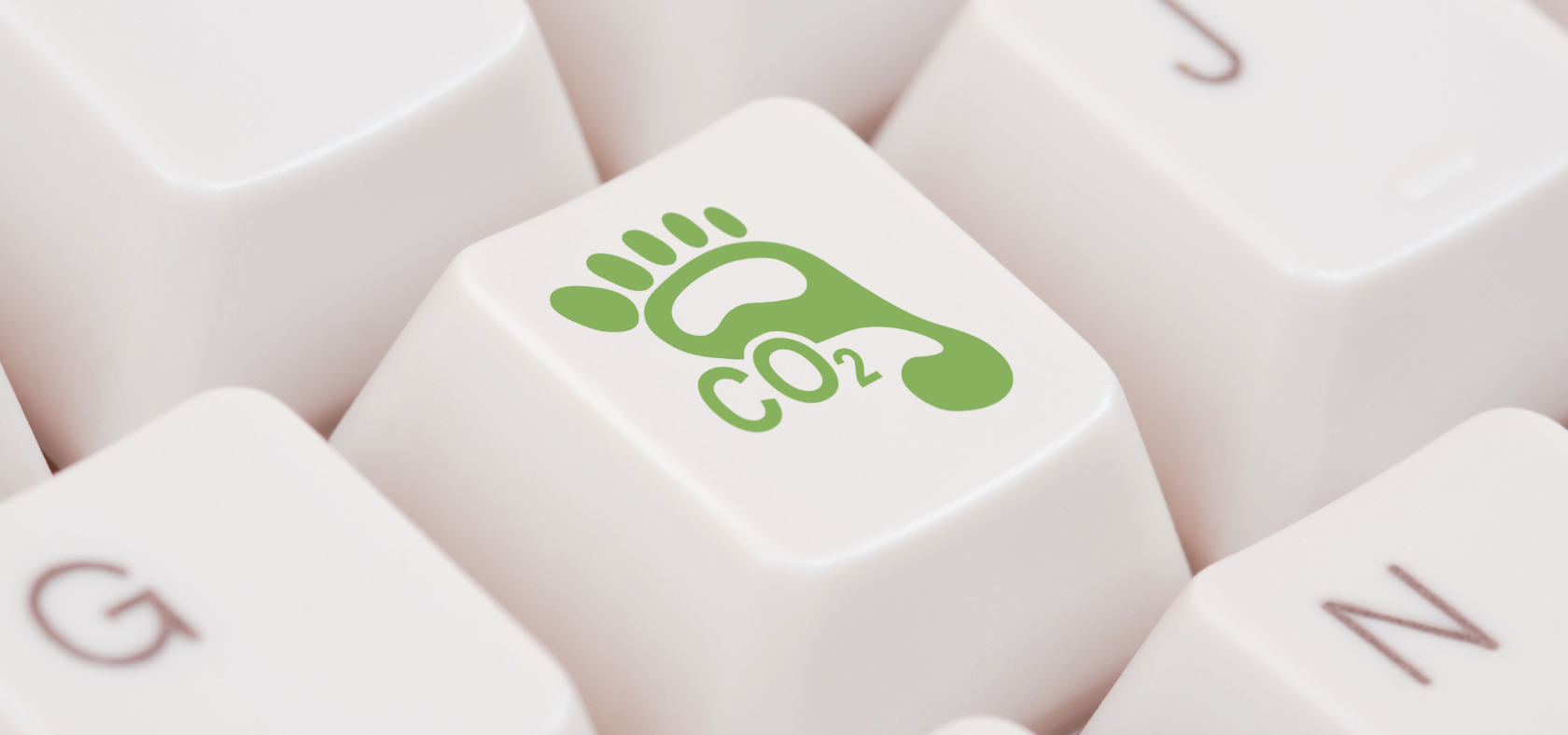Tastatur mit einem CO2-Fußabdruck-Symbol auf einer Taste